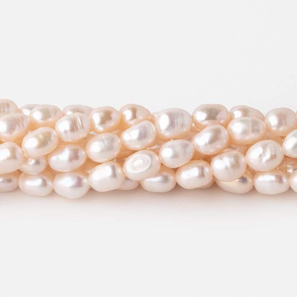 6x4mm Off White Oval Freshwater Pearl 61 pieces - The Bead Traders