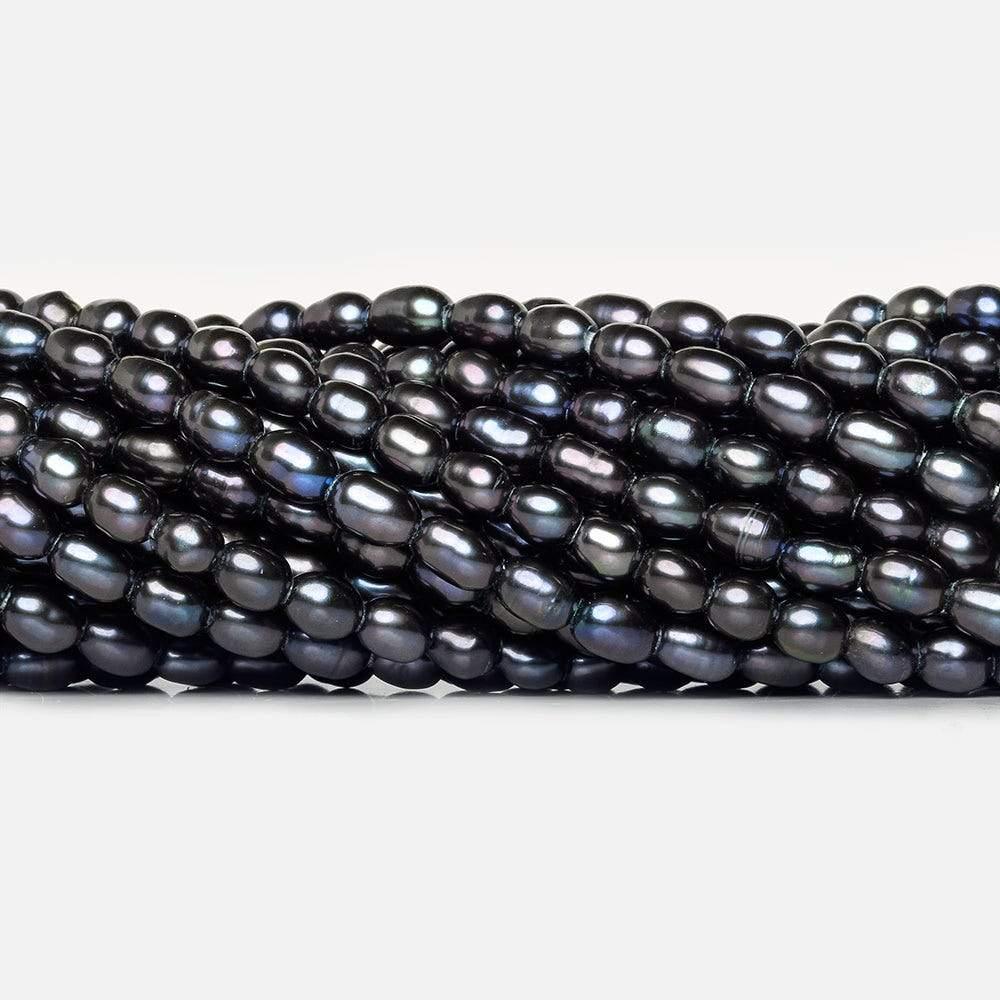 6x4mm Purple Peacock Large Hole Oval Pearls 15 inch 64 pieces - The Bead Traders