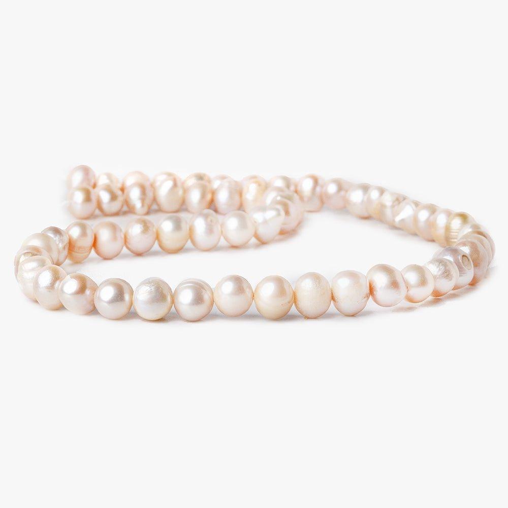 6x5mm - 7x6mm Pale Pink Baroque Freshwater Pearls 14 inch 60 beads - The Bead Traders