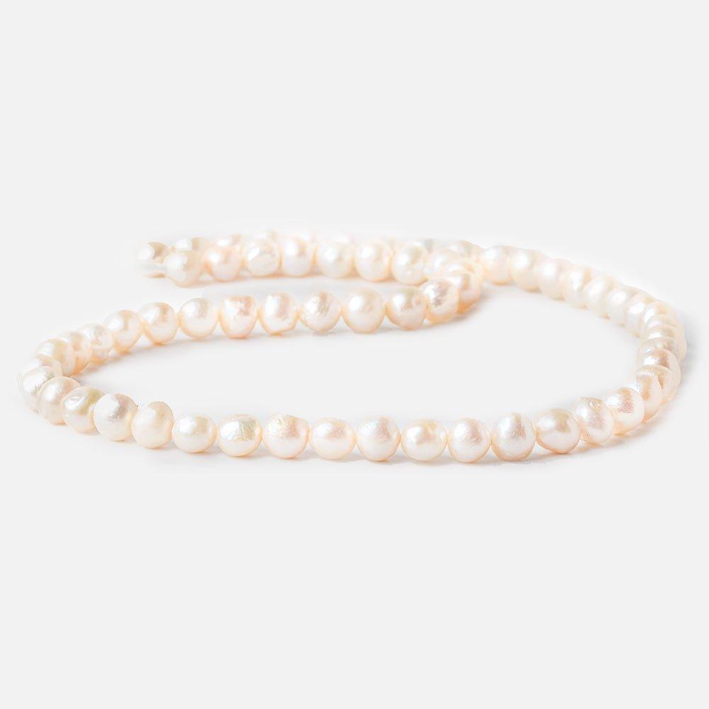 6x5mm - 7x6mm Peach Baroque Freshwater Pearls 14 inch 60 beads - The Bead Traders