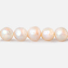 6x5mm - 7x6mm Peach Baroque Freshwater Pearls 14 inch 60 beads - The Bead Traders