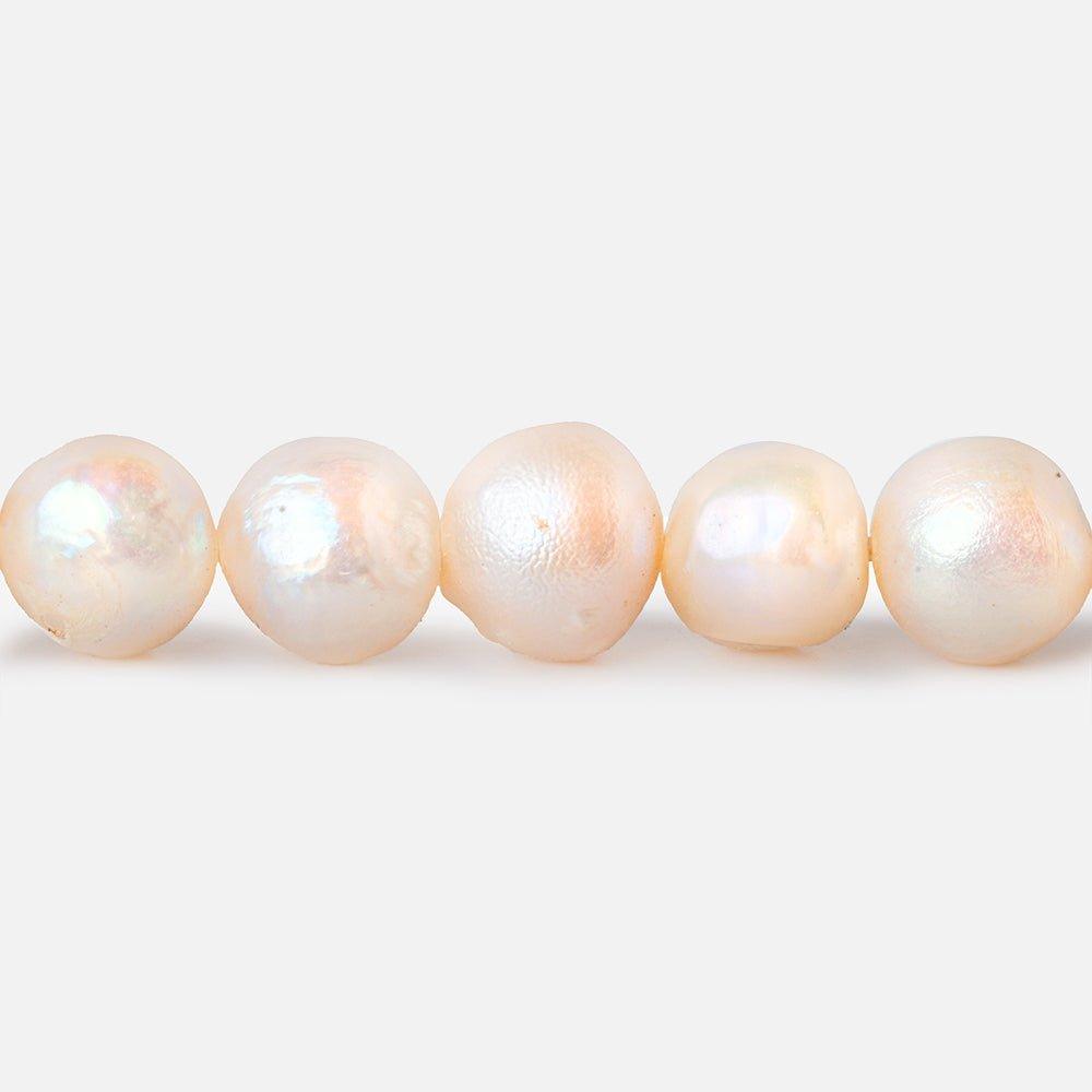 6x5mm - 7x6mm Peach Baroque Freshwater Pearls 14 inch 60 beads - The Bead Traders