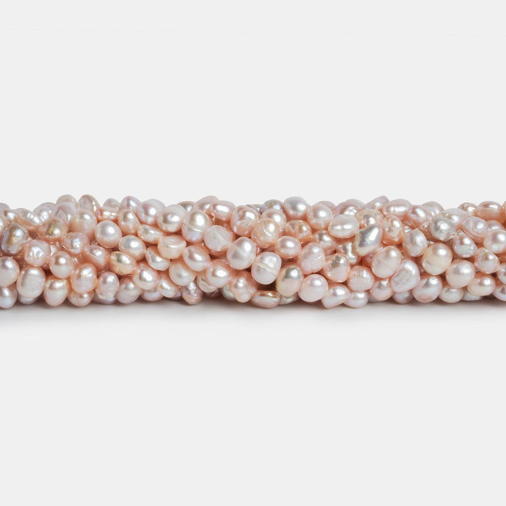 6x5mm Peach Baroque Pearls 15 inch 85 beads - The Bead Traders