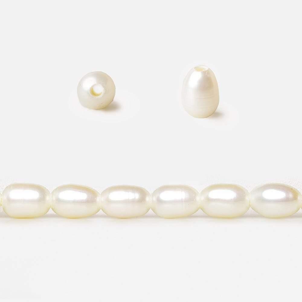 7-8 mm Cream Large Hole Oval Freshwater Pearls 16 inch 52 pieces - The Bead Traders