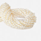 7-8 mm Cream Large Hole Oval Freshwater Pearls 16 inch 52 pieces - The Bead Traders