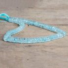 7-8mm Aquamarine Plain Heishi Beads 12 inch 130 pieces - The Bead Traders