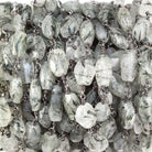 7.5-12mm Green Tourmalinated Quartz oval Black Gold Chain sold by the foot - The Bead Traders