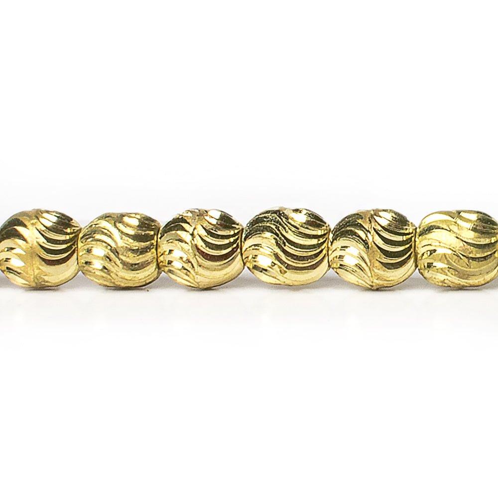 7mm Brass Oval Wave Beads, 8 inch - The Bead Traders
