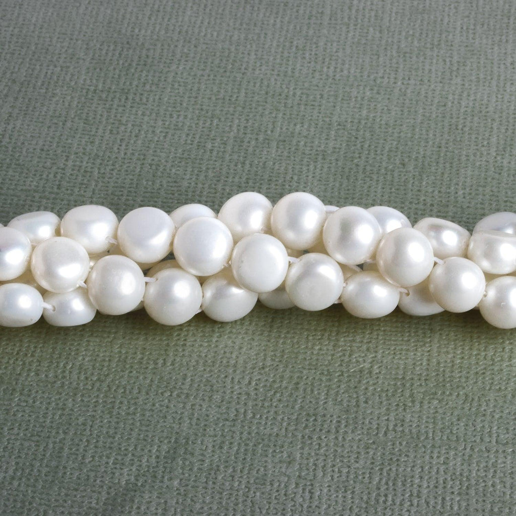 7mm White Double-Drilled Button Pearls 15 inch 50 pieces - The Bead Traders