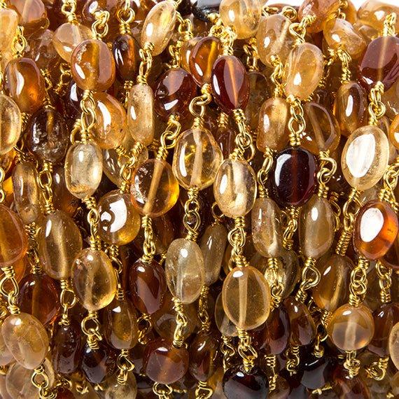 7x5-8x6mm Hessonite plain oval Gold Rosary Chain by the foot 23 beads - The Bead Traders