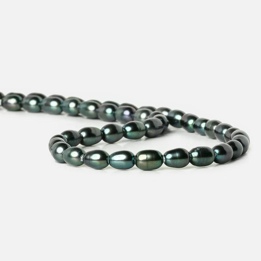 7x5mm Green Peacock Large Hole Oval Pearls 15 inch 48 pieces - The Bead Traders