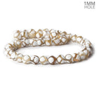8.5mm Tan & White Honeycomb Tibetan Agate faceted rounds 15 inch 43 beads - The Bead Traders