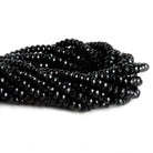 8mm Black Onyx Faceted Rondelles 15 inch 75 beads - The Bead Traders