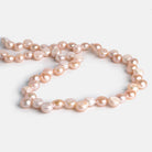 8mm Peachy Pink Button Pearls 15 inch 50 pieces - The Bead Traders