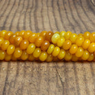 8mm Yellow Opal Plain Rondelles 16 inch 75 beads - The Bead Traders