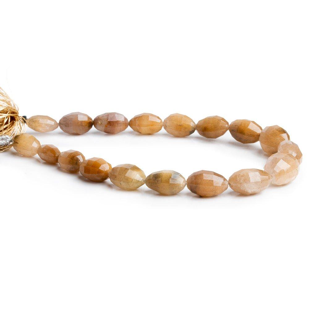 8x5-11x8mm Rutilated Quartz faceted oval beads 15 inch 40 pieces - The Bead Traders