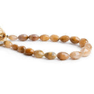 8x5-11x8mm Rutilated Quartz faceted oval beads 15 inch 40 pieces - The Bead Traders