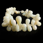 8x5-13x8mm Ethiopian Opal plain teardrops 8 inch 65 beads - The Bead Traders