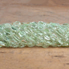 8x6-10x7mm Prasiolite plain oval Beads 14 inch 37 pieces - The Bead Traders