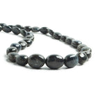 8x7-12x9mm Sapphire plain oval nugget beads 14 inch 38 pieces - The Bead Traders