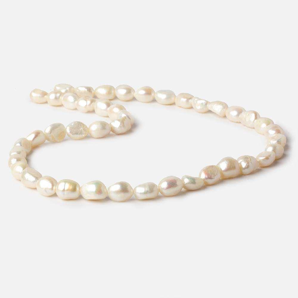 8x7mm-9x7mm Creamy White Straight Drill Baroque Freshwater Pearl 16 inch 44 pieces - The Bead Traders