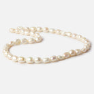 8x7mm-9x7mm Creamy White Straight Drill Baroque Freshwater Pearl 16 inch 44 pieces - The Bead Traders