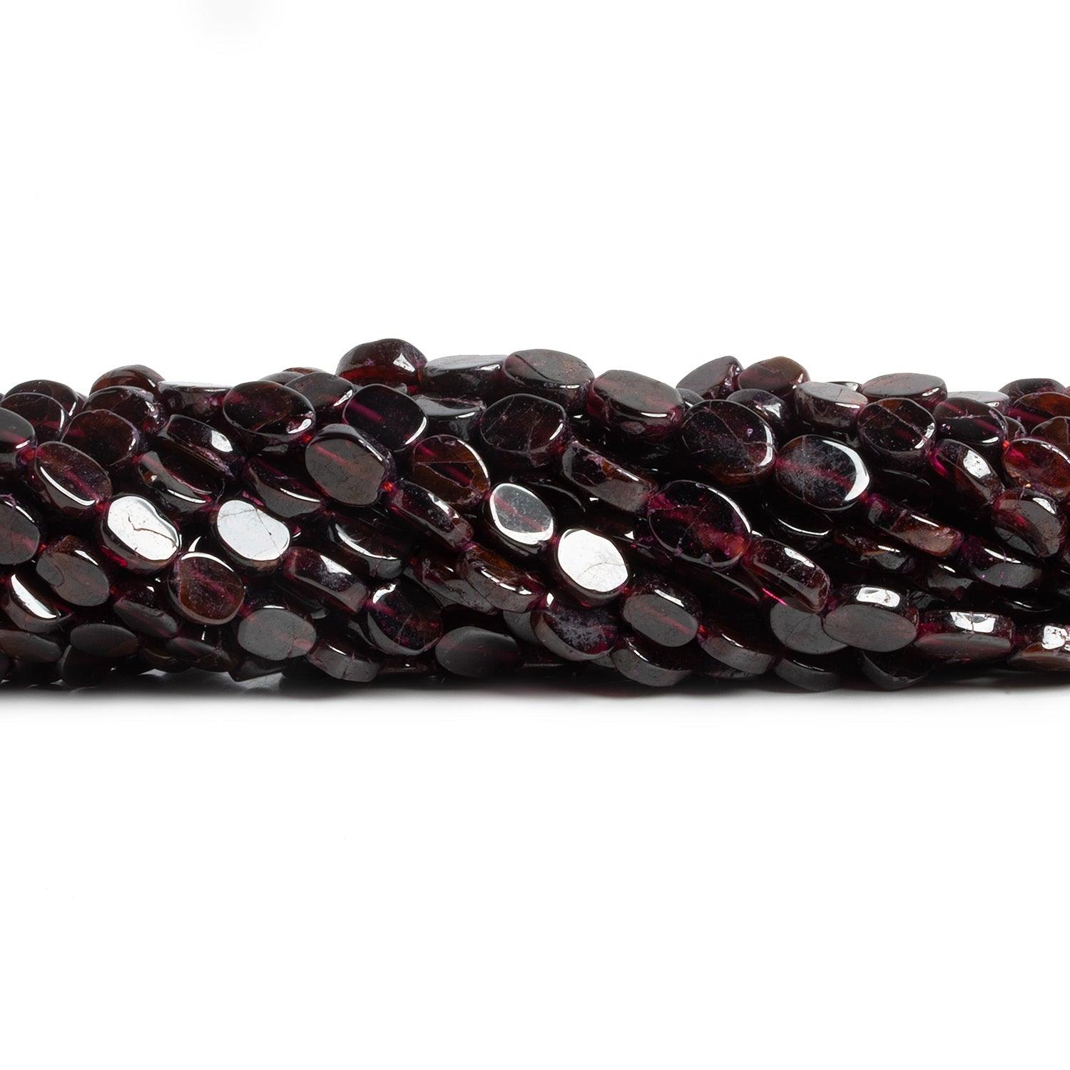 8x7mm Garnet Handcut Ovals 14 inch 35 beads - The Bead Traders