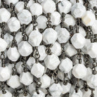 8x7mm Howlite Star Cut Faceted Round Black Gold Chain by the Foot 20 pieces - The Bead Traders