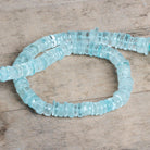 9-13mm Aquamarine Plain Heishi Beads 12 inch 115 pieces - The Bead Traders