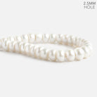 9.5-10mm Off White 2.5mm Large Hole Button Freshwater Pearls 30 pieces - The Bead Traders
