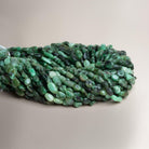 9x6mm Emerald Handcut Ovals 12 inch 27 beads - The Bead Traders