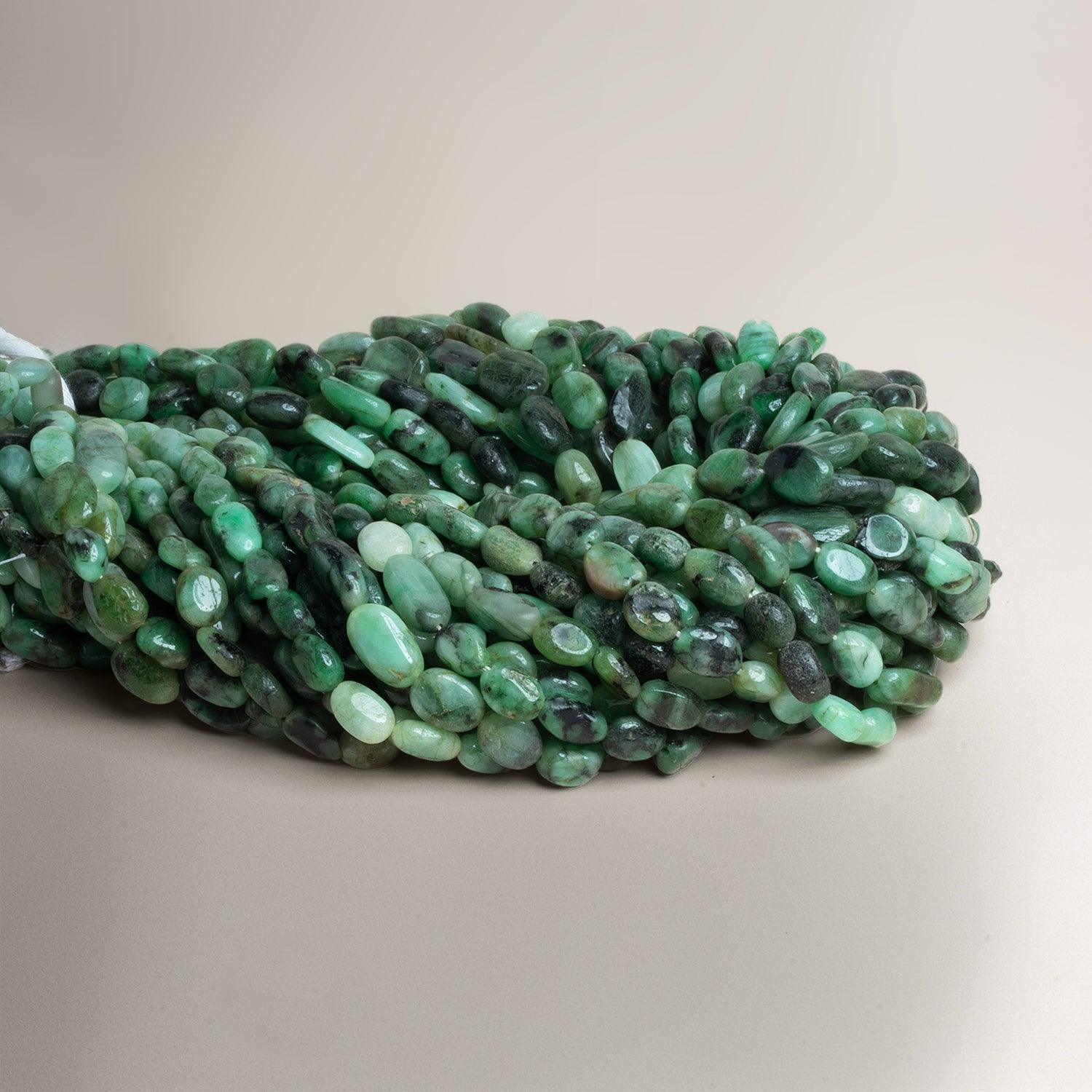 9x6mm Emerald Handcut Ovals 12 inch 27 beads - The Bead Traders