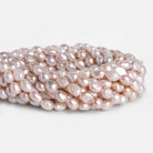 9x7mm Peachy Pink Baroque Pearls 15 inch 40 pieces - The Bead Traders