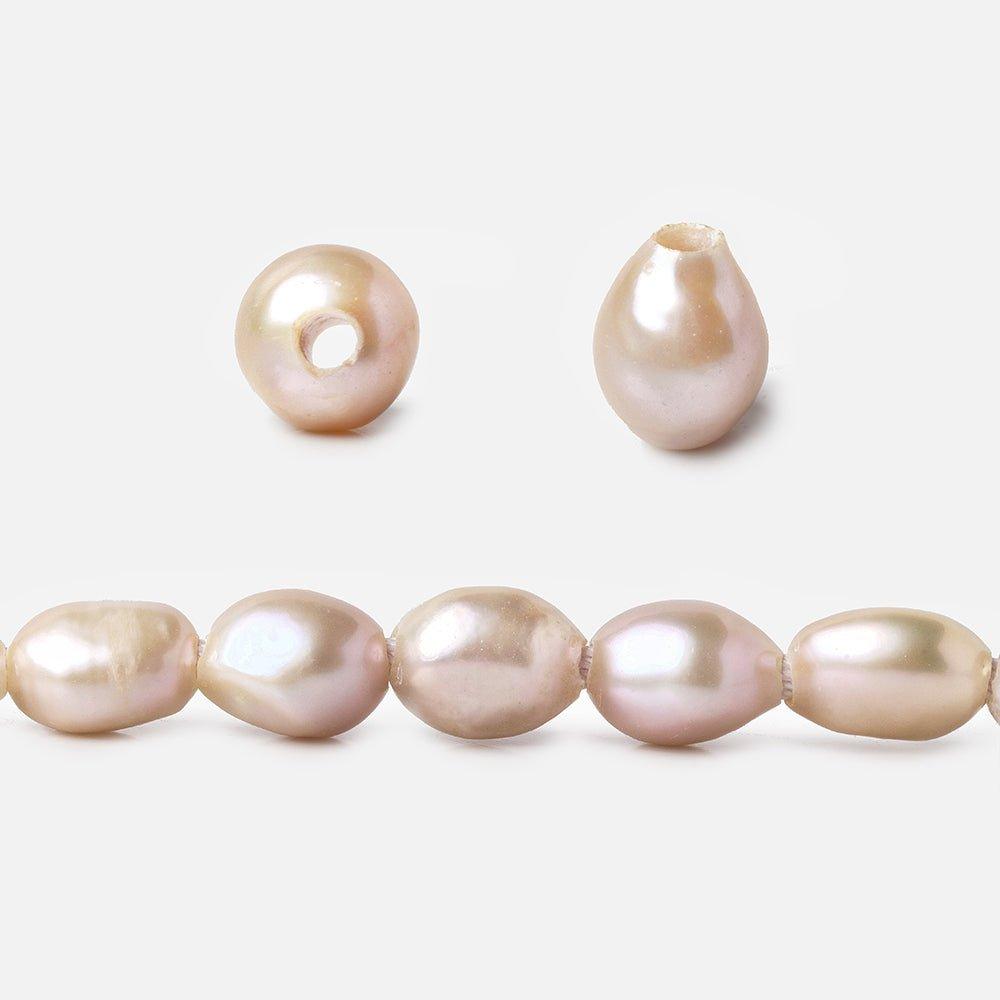 9x8-11x8mm Iridescent Pink 2.5mm Large hole Pearls 15 inch 35 pcs - The Bead Traders