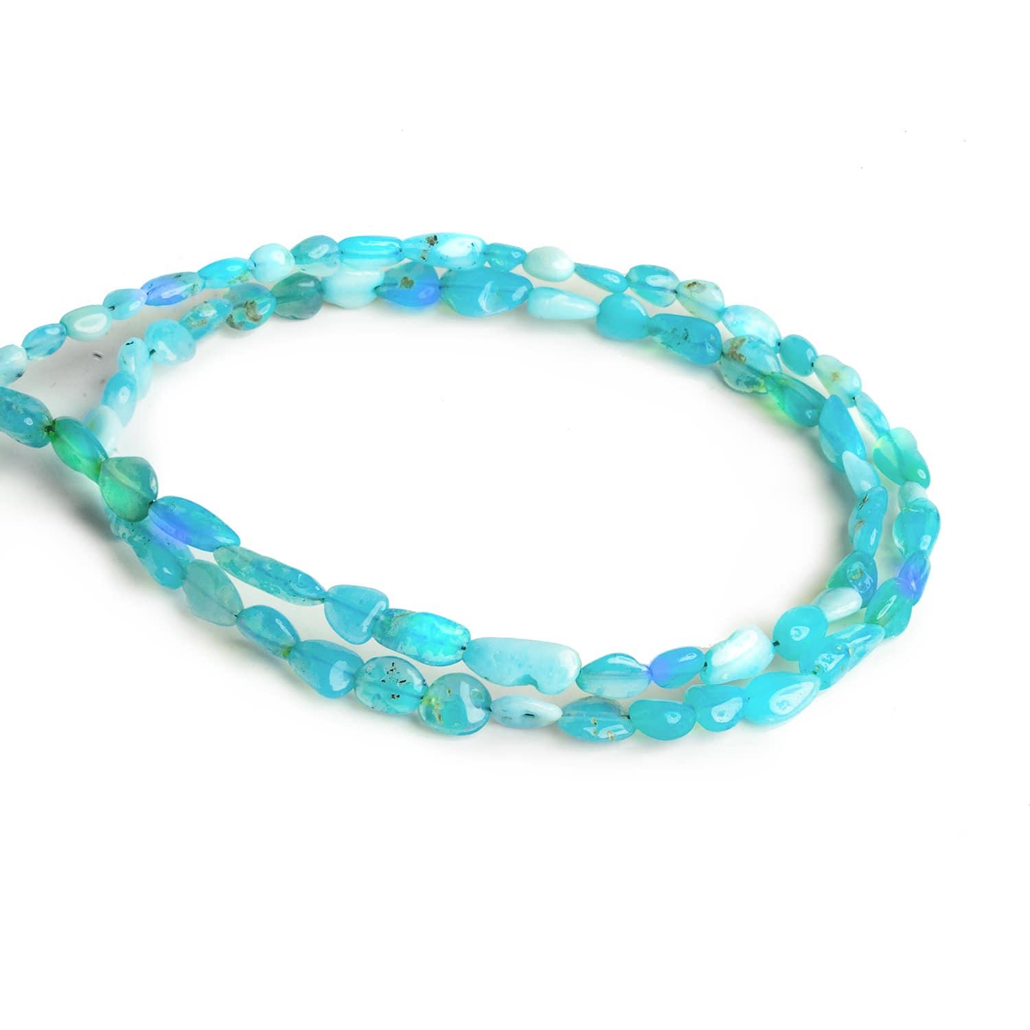 Blue Ethiopian Opal Plain Nuggets 15 inch 55 beads - The Bead Traders
