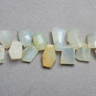 Blue Peruvian Opal Faceted Nugget Beads 8 inch 35 pieces - The Bead Traders