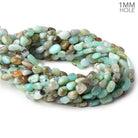 Blue Peruvian Opal plain nuggets 15 inch 49 beads - The Bead Traders