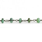 Brazilian Emerald Rondelle Black Gold Chain by the Foot 33 pieces - The Bead Traders