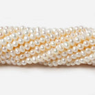 Cream Side Drilled Baroque Freshwater Pearls 16 inch 144 pieces - The Bead Traders