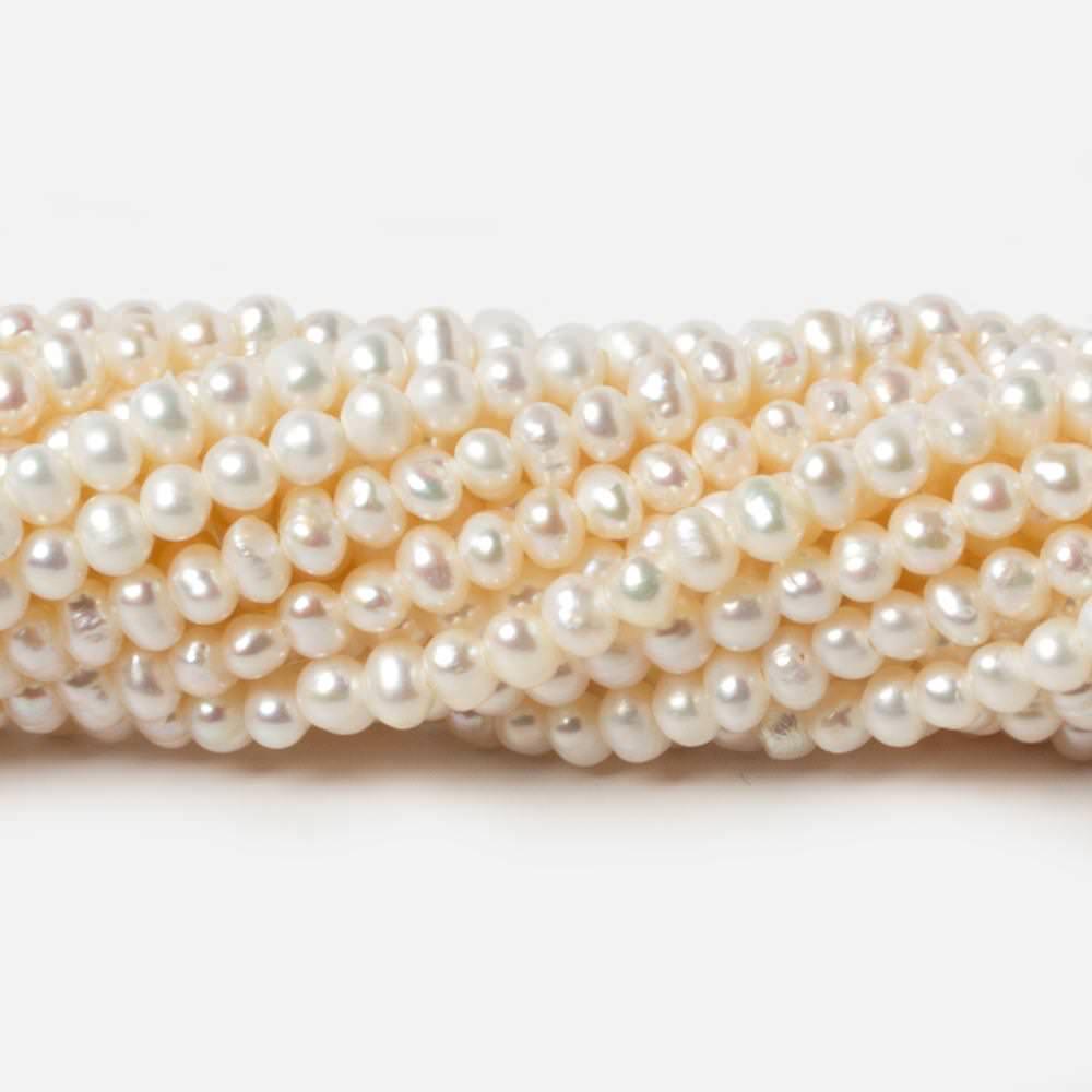 Cream Side Drilled Baroque Freshwater Pearls 16 inch 144 pieces - The Bead Traders