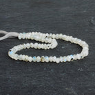 Dalmatian Rainbow Moonstone Rondelles 12 inch 74 beads - The Bead Traders