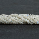 Dalmatian Rainbow Moonstone Rondelles 12 inch 74 beads - The Bead Traders