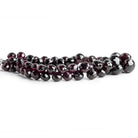 Garnet Faceted Candy Kiss Beads 8 inch 52 pieces - The Bead Traders