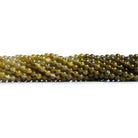 Golden Green Tourmaline Plain Rounds 14 inch 115 beads - The Bead Traders