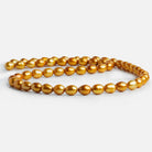 Golden Yellow Oval Freshwater Pearls 15 inch 55 pieces - The Bead Traders