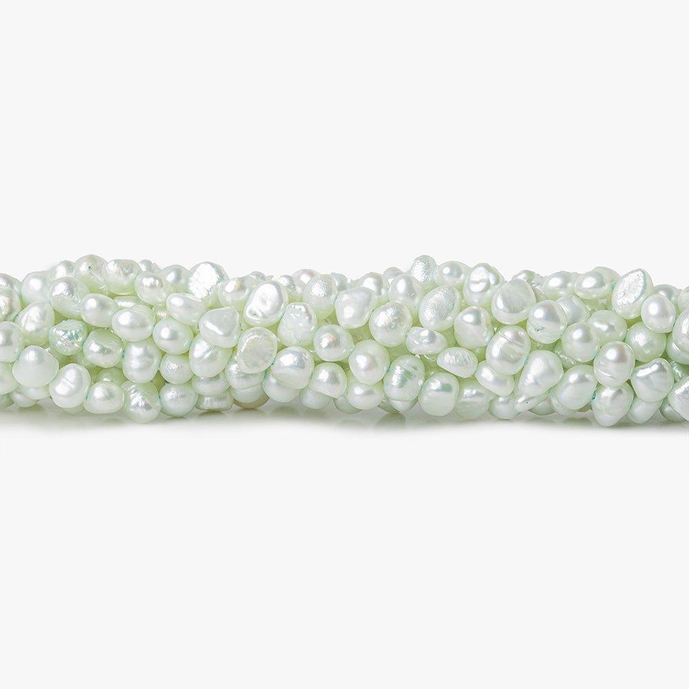 Light Pistachio Green Baroque Flat Freshwater Pearls 16 inch 87 pieces 5x4-6x4mm - The Bead Traders