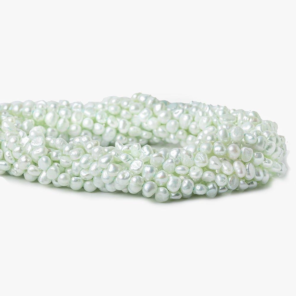 Light Pistachio Green Baroque Flat Freshwater Pearls 16 inch 87 pieces 5x4-6x4mm - The Bead Traders