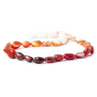 Mexican Fire Opal faceted nuggets 16 inch 33 beads 10x9x6-16x9x6mm - The Bead Traders