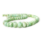 Natural Pale Emerald plain rondelles 18 inch 67 pieces 7mm - 16mm - The Bead Traders