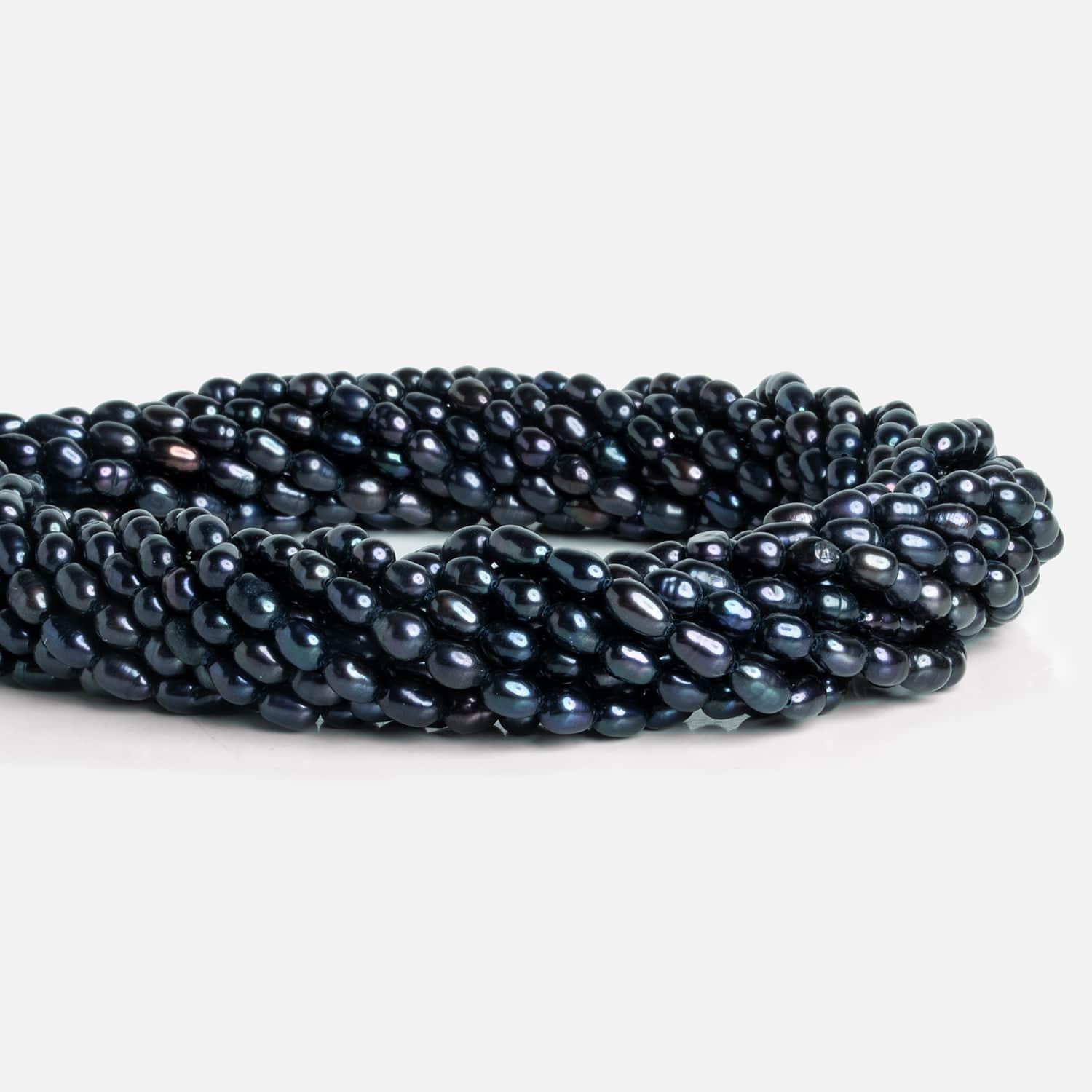Navy Peacock Oval Freshwater Pearls 15 inch 70 pieces - The Bead Traders